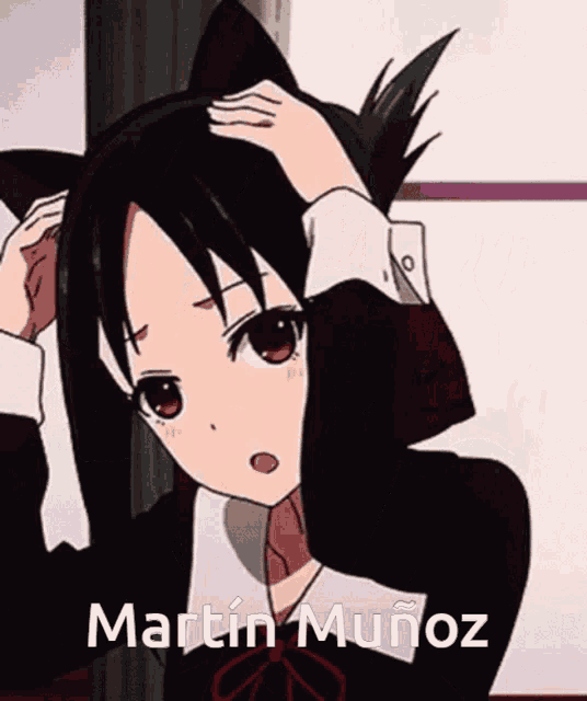 a picture of a girl with cat ears and the name martin munoz