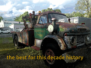 an old rusty tow truck with the words " the best for this decade history " below it
