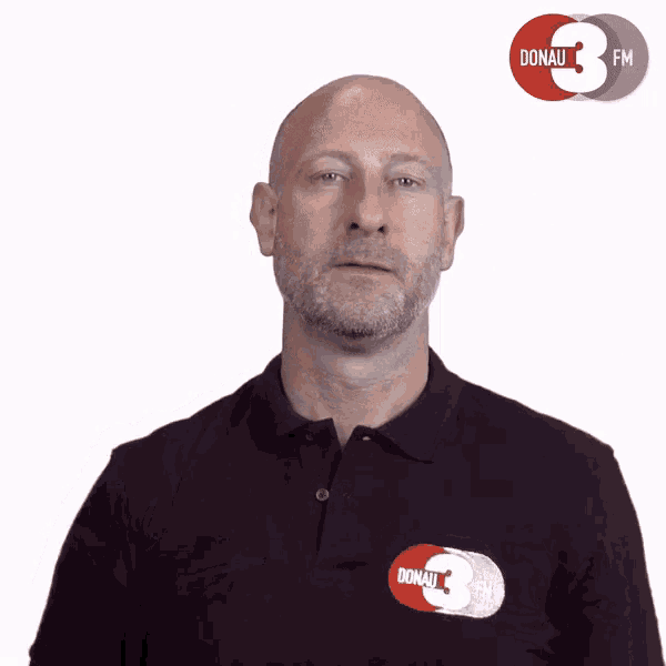 a man is wearing a shirt that says donau 3 fm on it
