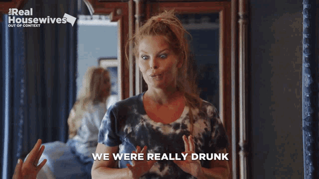 a woman covering her face with her hand and the words " we were really drunk " next to her