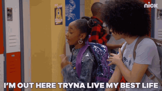a girl with a backpack says " i 'm out here tryna live my best life " while standing next to a boy