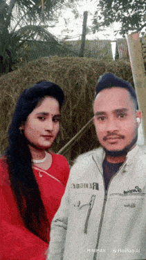 a man and a woman are posing for a picture and the man is wearing a jacket that says ' hailuo ai '