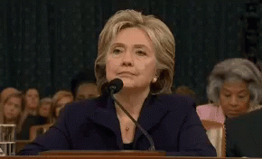 Hillary Clinton Whatever GIF - Hillary Clinton Whatever Dust Off Shoulder GIFs
