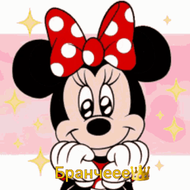 a cartoon drawing of minnie mouse with a red bow