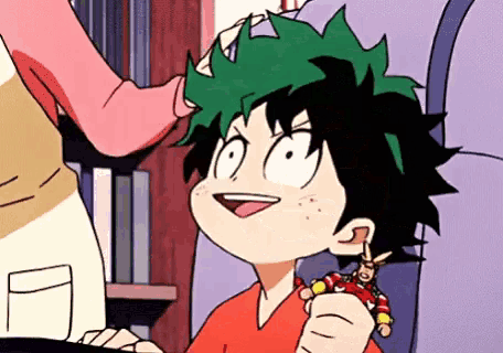 a cartoon of a boy holding a toy in his hand .
