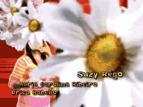a picture of a girl with a flower on her head and the name suzy rego at the bottom