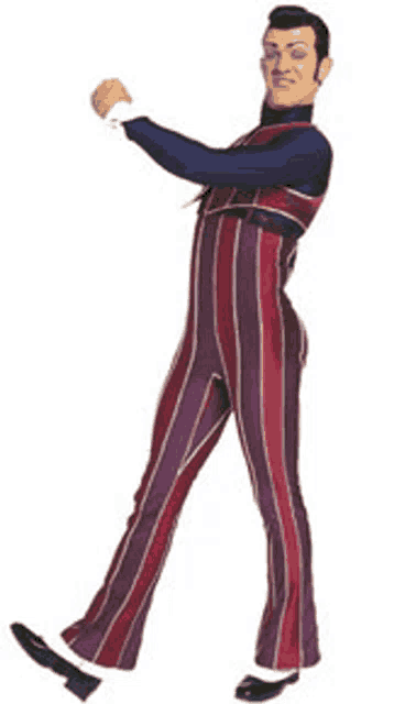a man in a red and purple striped jumpsuit is standing with his fist in the air .