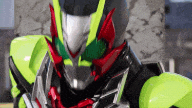 a close up of a masked rider 's face and helmet