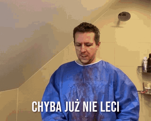 a man in a blue gown with the words chyba już nie leci written on it