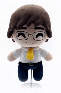 a stuffed toy wearing glasses and a yellow tie