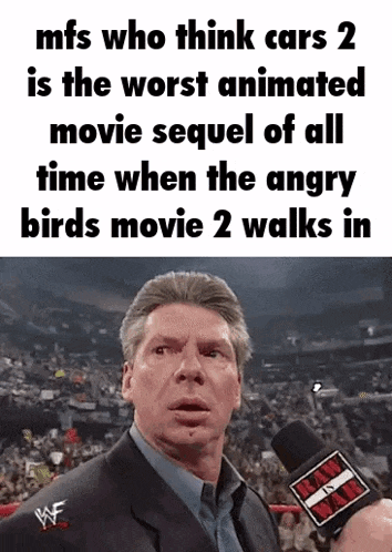 a man in a suit is talking into a microphone with the words mfs who think cars 2