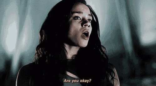 a woman is talking to another woman and asking if she is okay .