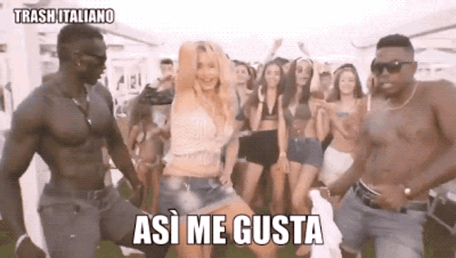 a group of people are dancing in a video with the caption trash italiano