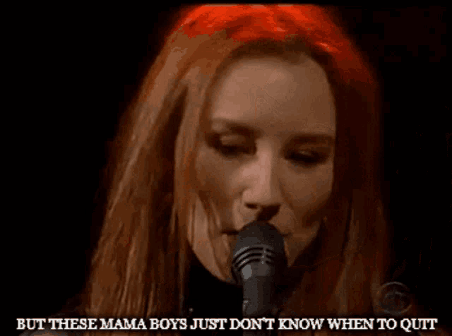 a woman singing into a microphone with the words " but these mama boys just don 't know when to quit " below her