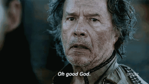 a man with a beard and long hair says oh good god