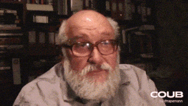 a man with glasses and a beard has the word coub on the bottom left