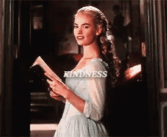 a woman in a blue dress is holding a book and the word kindness is above her head .
