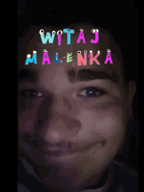 a close up of a person 's face with the words witaj malenka written above it
