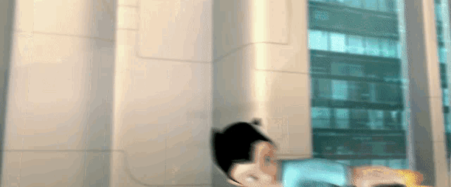 a cartoon character is flying through the air in front of a tall building .