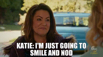 a woman is talking to another woman and says katie i 'm just going to smile and nod