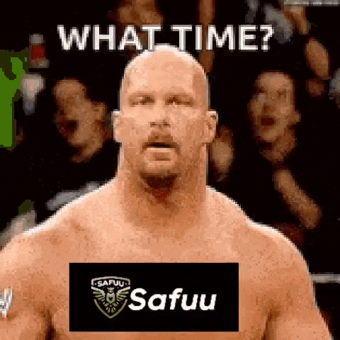 a man without a shirt is standing in front of a crowd with a sign on his chest that says `` what time ? ''