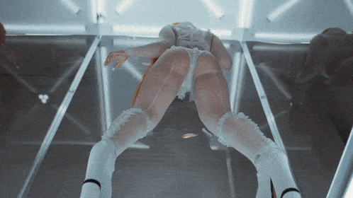 a woman 's butt is shown in a very revealing outfit