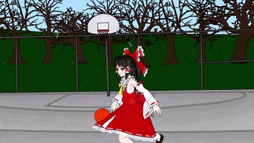 a girl in a red dress is dribbling a basketball on a court