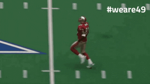 a football player wearing number 8 is running on a field
