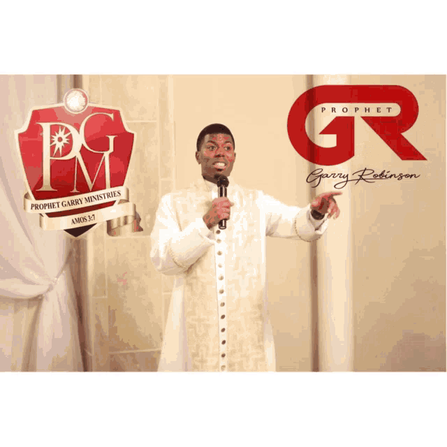 a man is giving a speech in front of a sign that says prophet garry ministries