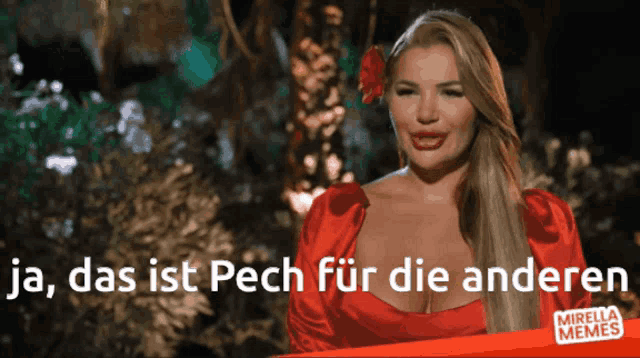 a woman in a red dress with a flower in her hair and the words " das ist pech für die anderen " on the bottom