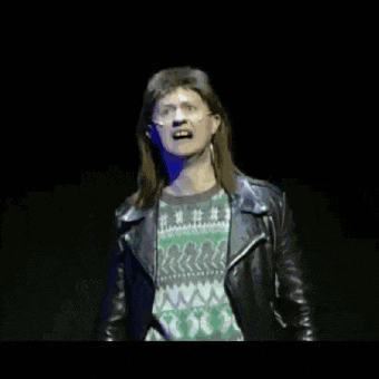 a man with long hair and a leather jacket says " i love you pauline "