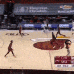 a basketball game is being played in a stadium with a sign that says chicago on it