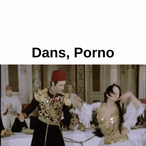 a man and a woman are dancing in front of a table with the words dans porno written above them