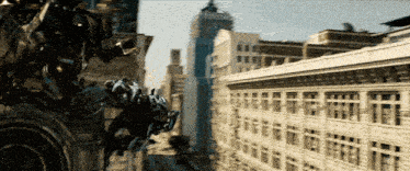 a blurred image of a city with a few buildings
