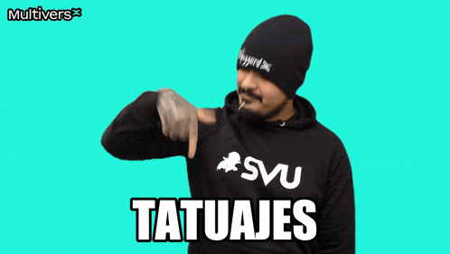 a man wearing a black hoodie with the word tatuajes on it