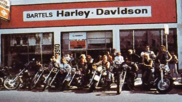 a harley davidson store with motorcycles parked outside
