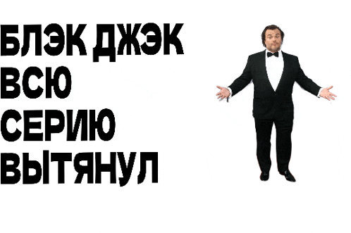 a man in a tuxedo stands with his arms outstretched in front of a white background