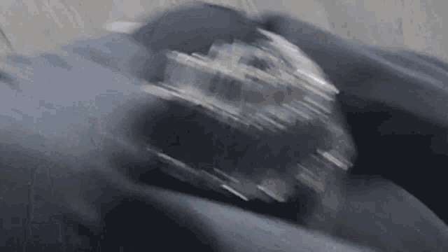 a blurred image of a person 's face with a few lines visible