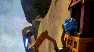 a video game scene with a cliff and a crate with a blue item in it