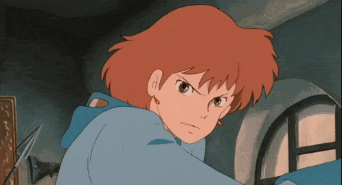 a cartoon character with red hair and a blue shirt