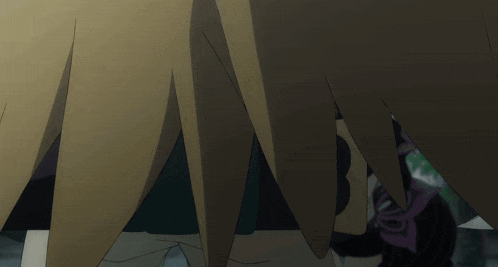 a close up of a person 's hair with a knife in the background