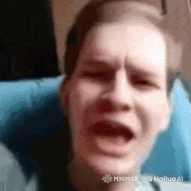 a close up of a man 's face with a watermark that says hailuo ai on the bottom