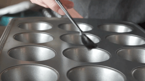 Adding Oil In The Mixture Two Plaid Aprons GIF