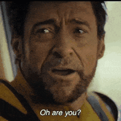 a man with a beard is saying oh are you ?