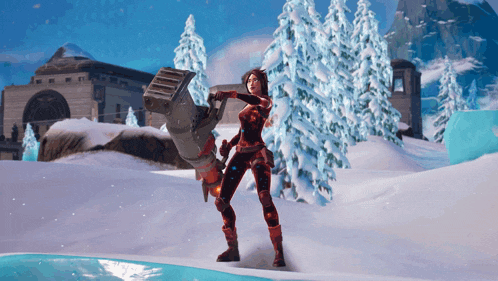 a woman in a red outfit is holding a large object in a snowy area