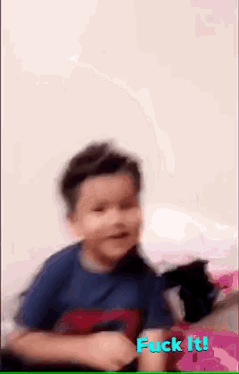 a blurry picture of a young boy with the words " fuck it " written on the bottom