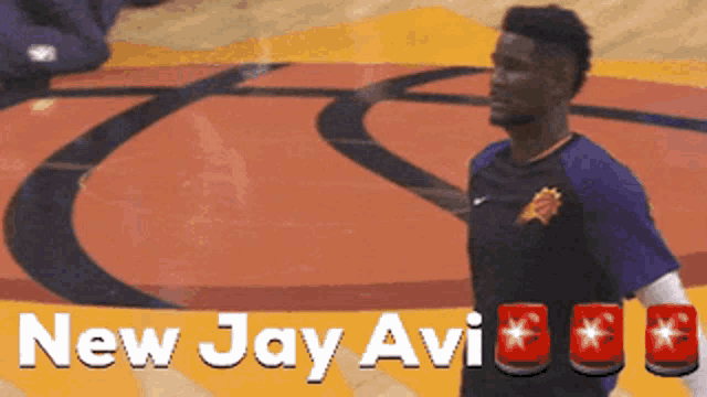 a basketball player stands on a court with the words new jay avi above him