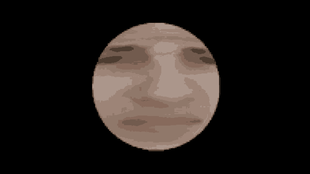 a close up of a person 's face in a circle on a black background