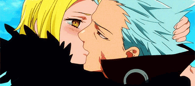 a man and a woman are kissing and the man has a c on his collar
