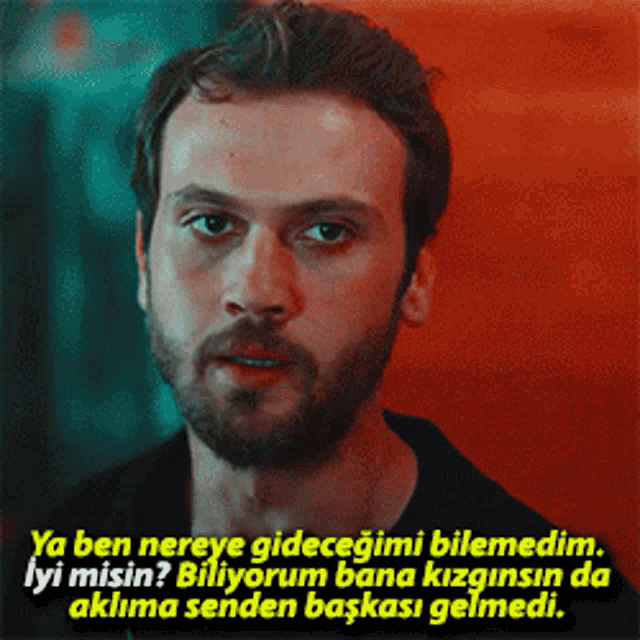 a man with a beard and a foreign language caption